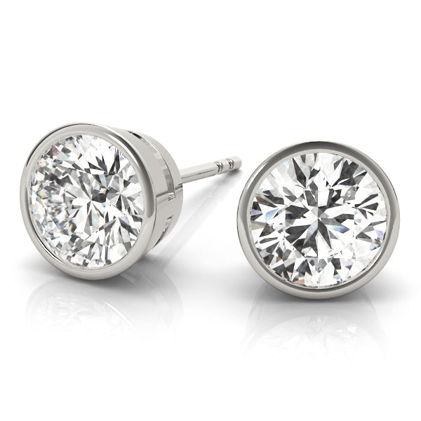 0.1CT TPRED BEZEL EARRINGS Complete per pair.